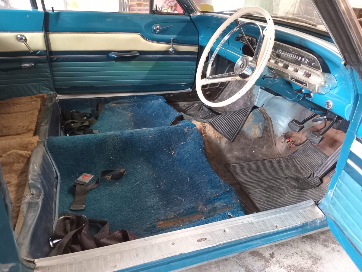 Classic Ford Falcon interior with worn, dirty original blue carpet — before carpet replacement at Jay's Auto Trim